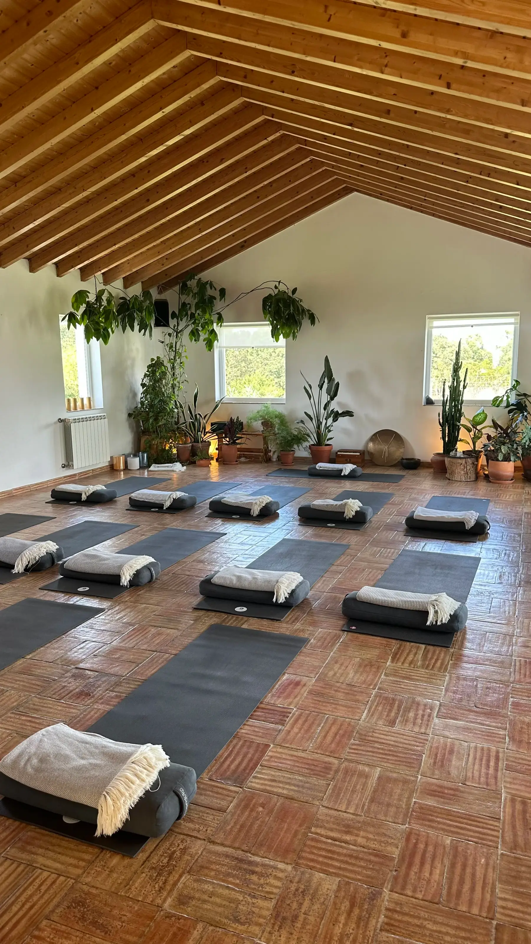 Sam seated with singing bowls